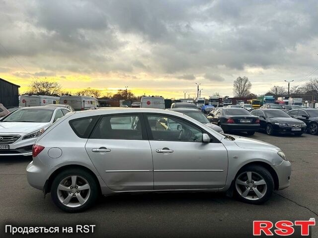 Серый Мазда 3, объемом двигателя 1.6 л и пробегом 125 тыс. км за 4200 $, фото 2 на Automoto.ua