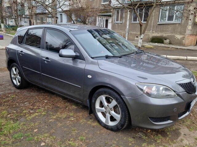 Серый Мазда 3, объемом двигателя 2 л и пробегом 203 тыс. км за 5200 $, фото 1 на Automoto.ua