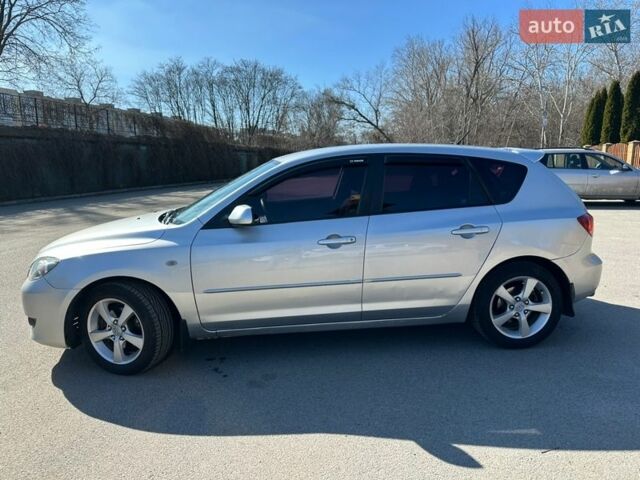 Серый Мазда 3, объемом двигателя 1.6 л и пробегом 269 тыс. км за 4750 $, фото 3 на Automoto.ua
