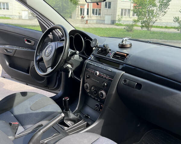 Сірий Мазда 3, об'ємом двигуна 1.6 л та пробігом 244 тис. км за 3700 $, фото 33 на Automoto.ua