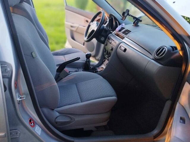 Сірий Мазда 3, об'ємом двигуна 1.4 л та пробігом 214 тис. км за 4299 $, фото 13 на Automoto.ua