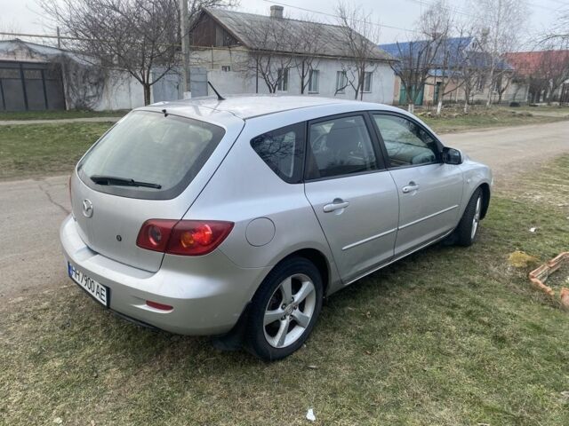 Сірий Мазда 3, об'ємом двигуна 1.6 л та пробігом 126 тис. км за 4200 $, фото 4 на Automoto.ua