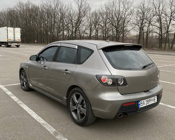 Сірий Мазда 3, об'ємом двигуна 2 л та пробігом 320 тис. км за 4500 $, фото 4 на Automoto.ua