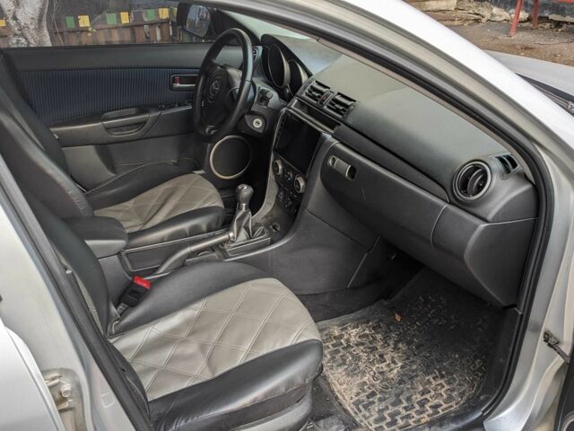 Сірий Мазда 3, об'ємом двигуна 2 л та пробігом 145 тис. км за 3999 $, фото 17 на Automoto.ua