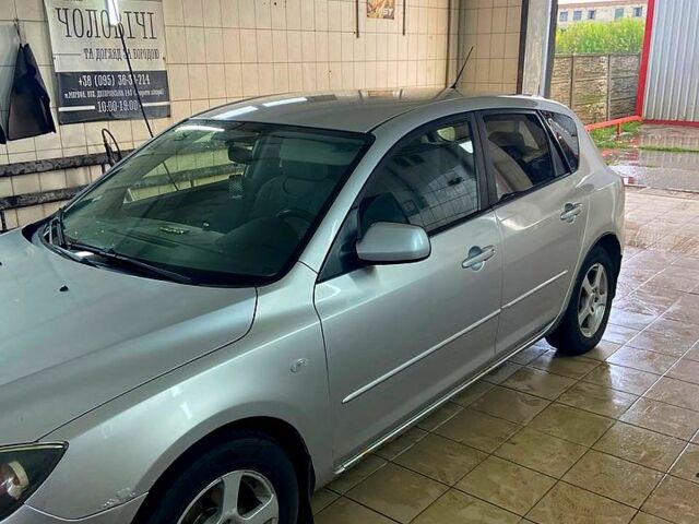 Серый Мазда 3, объемом двигателя 1.3 л и пробегом 193 тыс. км за 3100 $, фото 10 на Automoto.ua