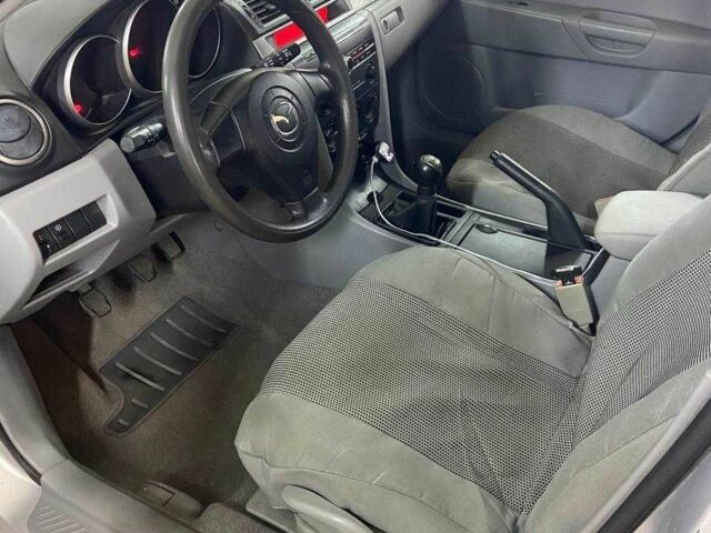 Сірий Мазда 3, об'ємом двигуна 1.3 л та пробігом 194 тис. км за 2900 $, фото 12 на Automoto.ua