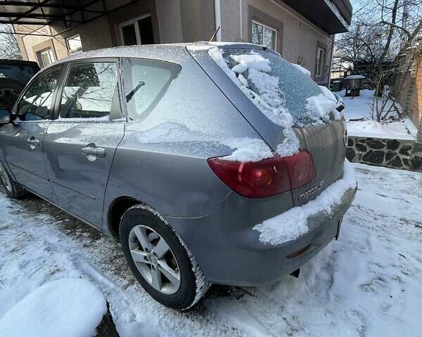 Серый Мазда 3, объемом двигателя 1.6 л и пробегом 215 тыс. км за 3800 $, фото 4 на Automoto.ua