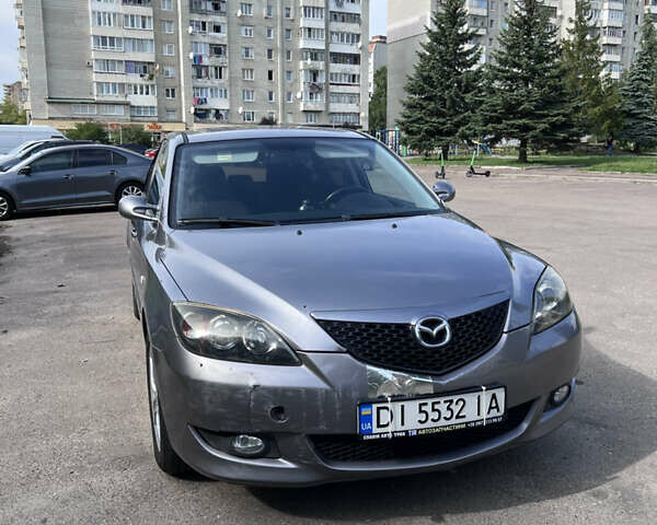 Сірий Мазда 3, об'ємом двигуна 1.6 л та пробігом 244 тис. км за 3700 $, фото 4 на Automoto.ua