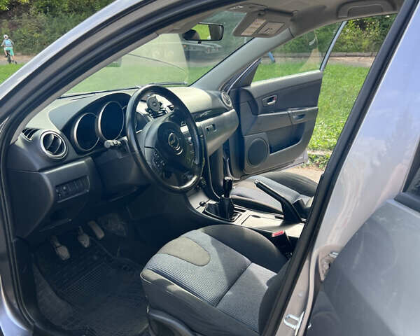 Сірий Мазда 3, об'ємом двигуна 1.6 л та пробігом 244 тис. км за 3700 $, фото 9 на Automoto.ua