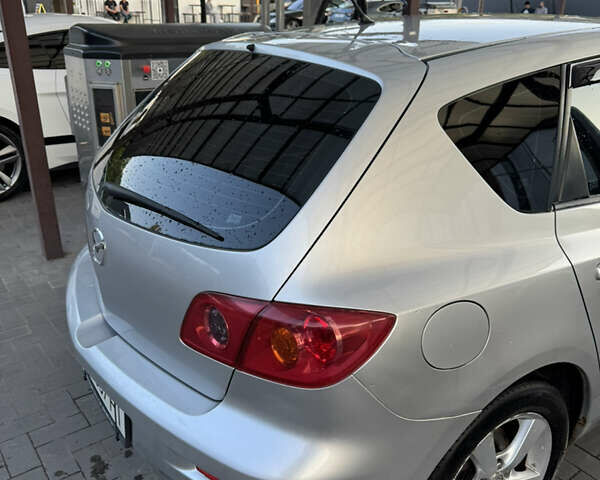 Серый Мазда 3, объемом двигателя 1.56 л и пробегом 170 тыс. км за 4800 $, фото 11 на Automoto.ua