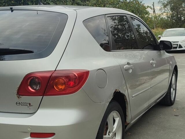 Серый Мазда 3, объемом двигателя 1.6 л и пробегом 443 тыс. км за 2500 $, фото 14 на Automoto.ua