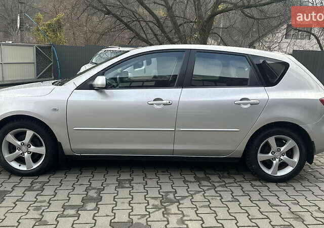 Серый Мазда 3, объемом двигателя 1.6 л и пробегом 202 тыс. км за 4400 $, фото 6 на Automoto.ua