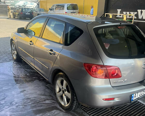 Сірий Мазда 3, об'ємом двигуна 1.6 л та пробігом 243 тис. км за 4000 $, фото 3 на Automoto.ua