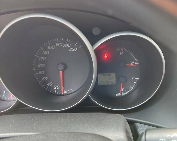 Сірий Мазда 3, об'ємом двигуна 2 л та пробігом 203 тис. км за 4200 $, фото 3 на Automoto.ua