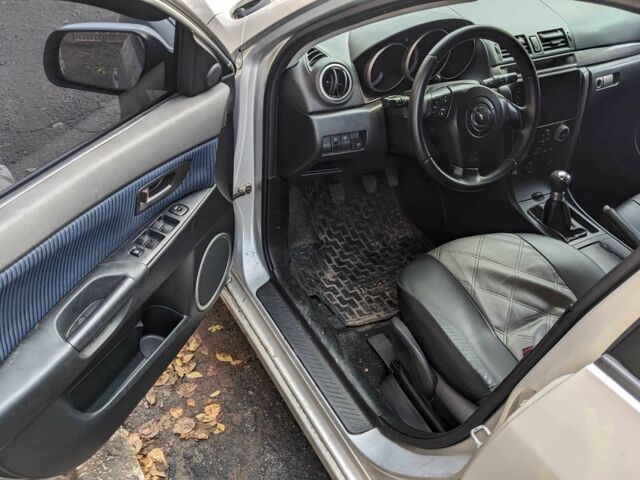 Сірий Мазда 3, об'ємом двигуна 2 л та пробігом 145 тис. км за 3999 $, фото 18 на Automoto.ua