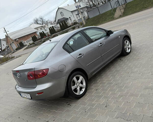 Серый Мазда 3, объемом двигателя 1.6 л и пробегом 222 тыс. км за 3599 $, фото 12 на Automoto.ua