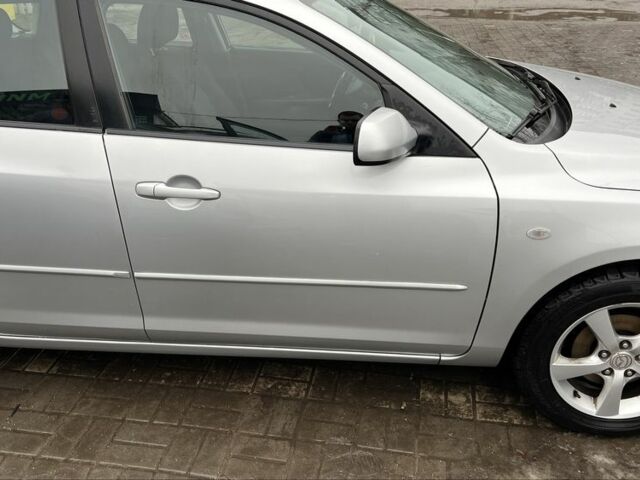 Сірий Мазда 3, об'ємом двигуна 1.6 л та пробігом 188 тис. км за 4450 $, фото 3 на Automoto.ua