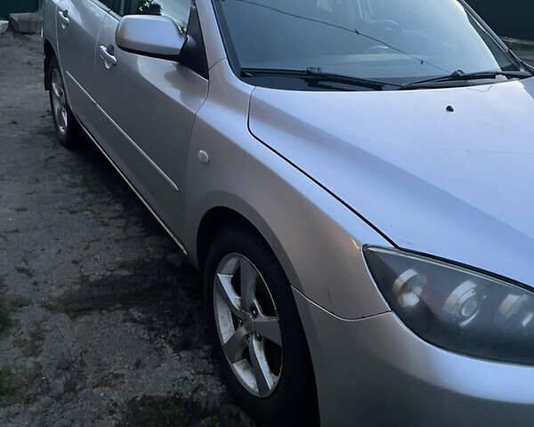 Серый Мазда 3, объемом двигателя 1.6 л и пробегом 270 тыс. км за 3200 $, фото 3 на Automoto.ua