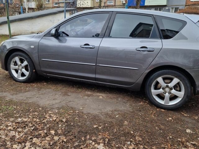 Серый Мазда 3, объемом двигателя 2 л и пробегом 203 тыс. км за 5200 $, фото 3 на Automoto.ua