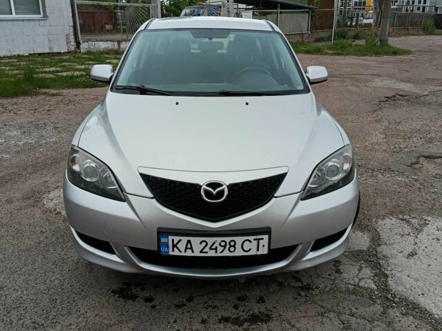 Серый Мазда 3, объемом двигателя 1.6 л и пробегом 244 тыс. км за 4350 $, фото 1 на Automoto.ua