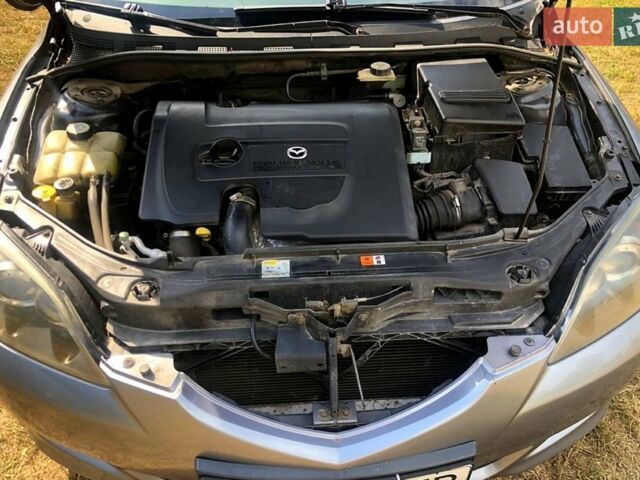 Сірий Мазда 3, об'ємом двигуна 1.6 л та пробігом 350 тис. км за 4300 $, фото 7 на Automoto.ua