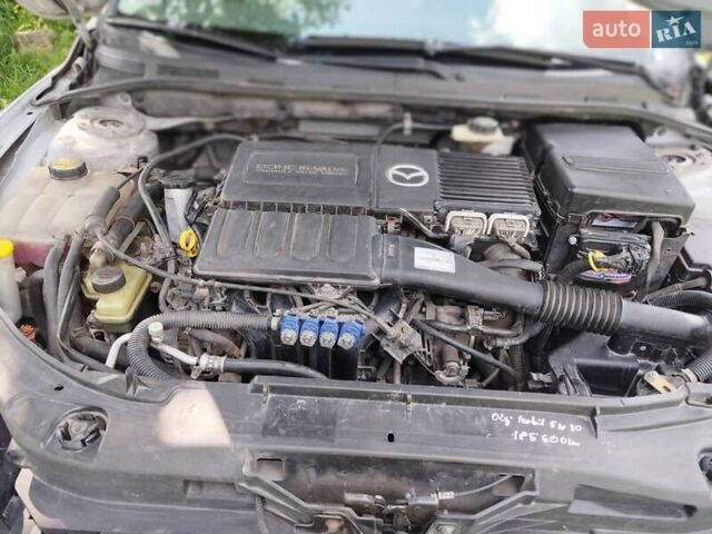 Сірий Мазда 3, об'ємом двигуна 1.4 л та пробігом 214 тис. км за 4299 $, фото 9 на Automoto.ua