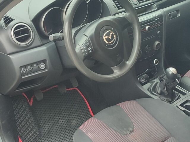 Серый Мазда 3, объемом двигателя 1.6 л и пробегом 443 тыс. км за 2500 $, фото 4 на Automoto.ua