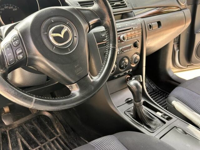 Серый Мазда 3, объемом двигателя 1.6 л и пробегом 318 тыс. км за 3600 $, фото 7 на Automoto.ua