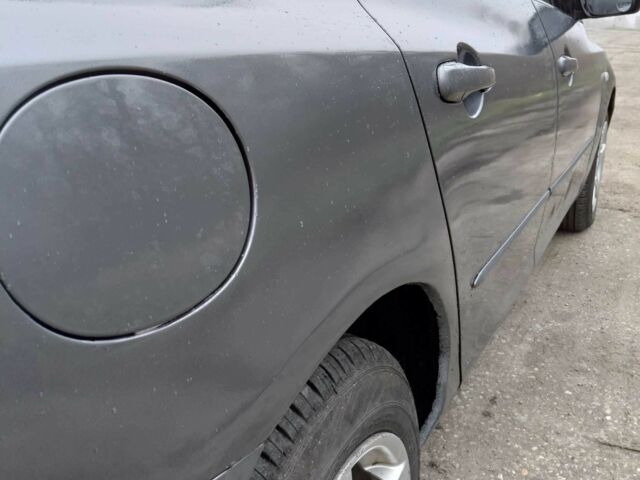 Сірий Мазда 3, об'ємом двигуна 1.6 л та пробігом 244 тис. км за 4500 $, фото 3 на Automoto.ua