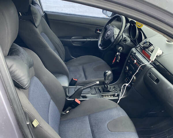 Сірий Мазда 3, об'ємом двигуна 1.6 л та пробігом 283 тис. км за 3800 $, фото 7 на Automoto.ua