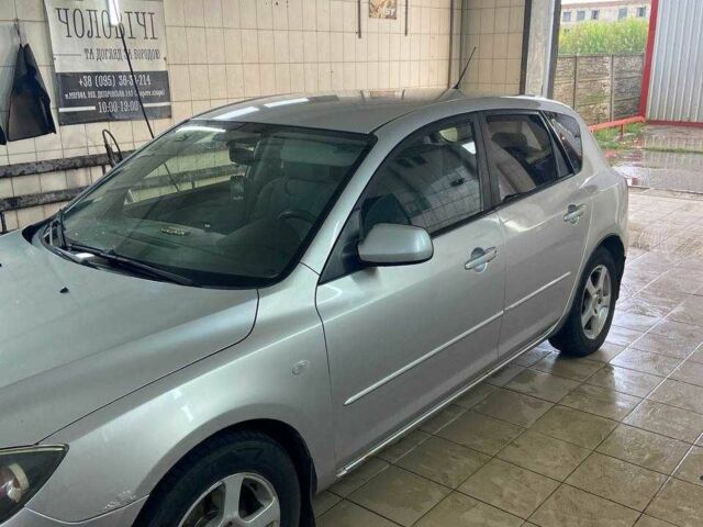 Сірий Мазда 3, об'ємом двигуна 1.3 л та пробігом 194 тис. км за 2900 $, фото 8 на Automoto.ua