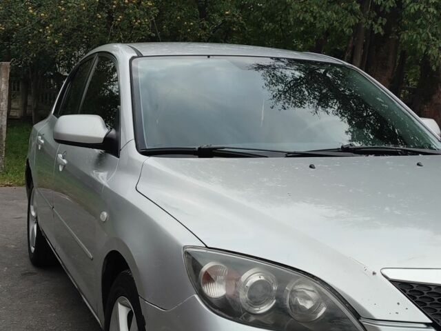 Серый Мазда 3, объемом двигателя 1.6 л и пробегом 443 тыс. км за 2500 $, фото 2 на Automoto.ua