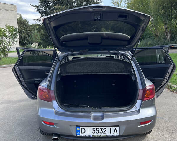 Сірий Мазда 3, об'ємом двигуна 1.6 л та пробігом 244 тис. км за 3700 $, фото 31 на Automoto.ua