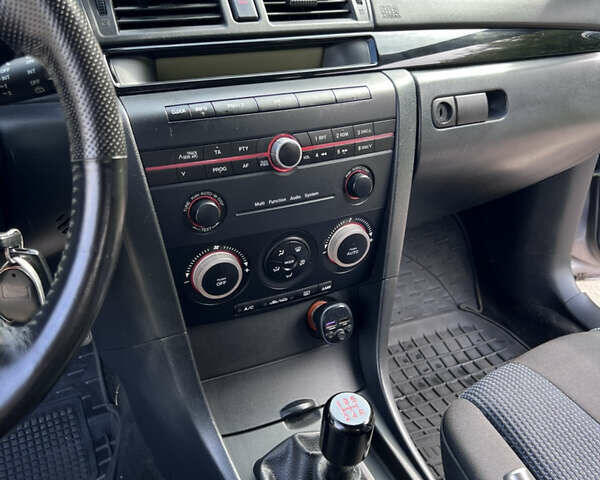 Сірий Мазда 3, об'ємом двигуна 1.6 л та пробігом 244 тис. км за 3700 $, фото 22 на Automoto.ua