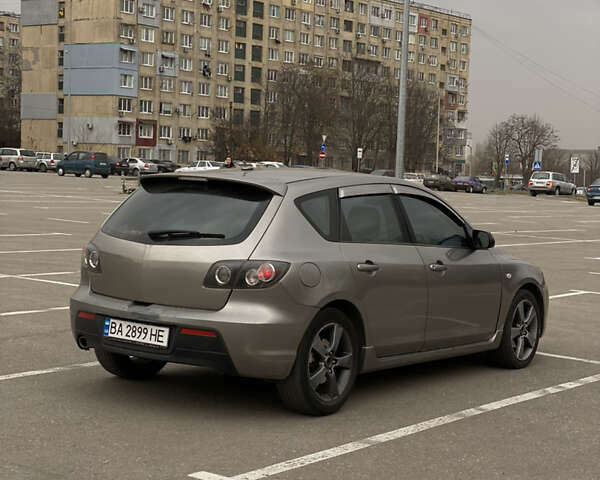 Сірий Мазда 3, об'ємом двигуна 2 л та пробігом 320 тис. км за 4500 $, фото 3 на Automoto.ua