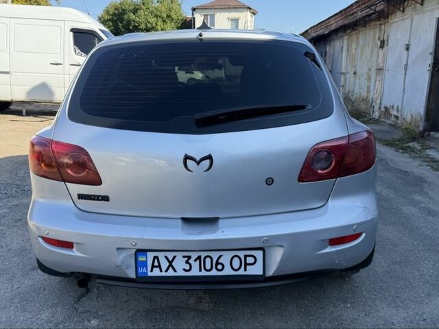 Серый Мазда 3, объемом двигателя 1.6 л и пробегом 350 тыс. км за 4471 $, фото 5 на Automoto.ua