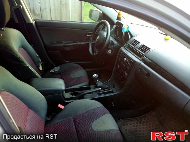 Серый Мазда 3, объемом двигателя 2 л и пробегом 280 тыс. км за 1500 $, фото 2 на Automoto.ua