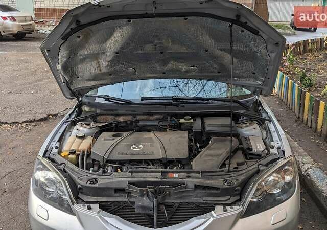 Серый Мазда 3, объемом двигателя 2 л и пробегом 145 тыс. км за 3999 $, фото 5 на Automoto.ua