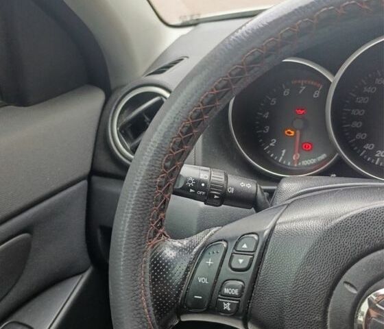 Серый Мазда 3, объемом двигателя 1.3 л и пробегом 247 тыс. км за 3300 $, фото 4 на Automoto.ua