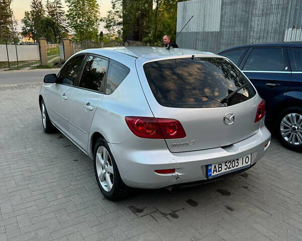 Серый Мазда 3, объемом двигателя 1.6 л и пробегом 229 тыс. км за 4000 $, фото 6 на Automoto.ua