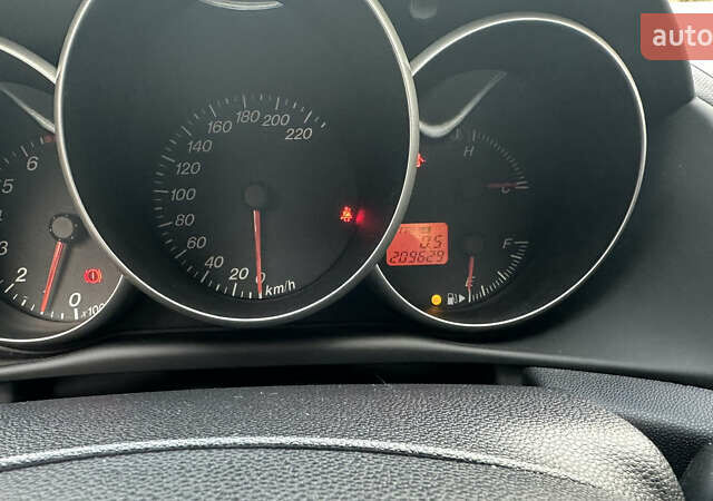 Серый Мазда 3, объемом двигателя 1.6 л и пробегом 202 тыс. км за 4400 $, фото 11 на Automoto.ua