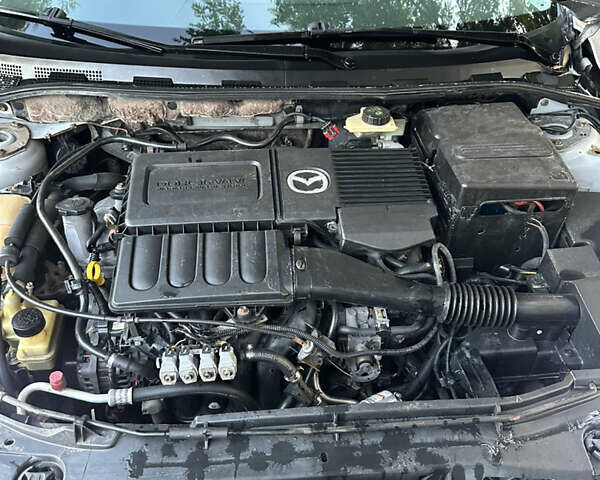 Сірий Мазда 3, об'ємом двигуна 1.6 л та пробігом 267 тис. км за 4000 $, фото 16 на Automoto.ua