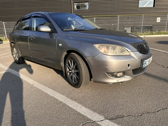 Серый Мазда 3, объемом двигателя 2 л и пробегом 240 тыс. км за 3518 $, фото 1 на Automoto.ua