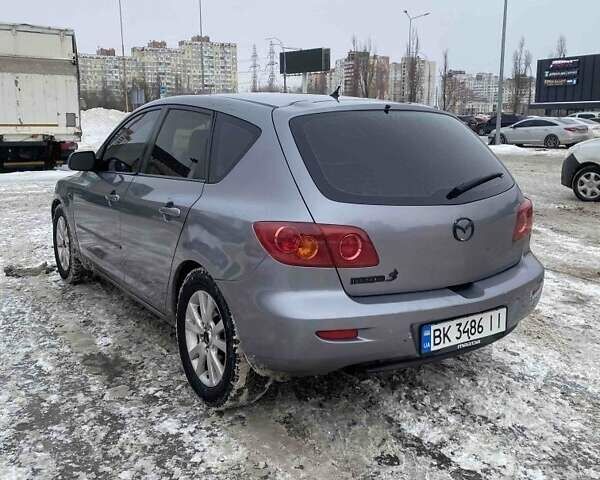 Сірий Мазда 3, об'ємом двигуна 1.6 л та пробігом 289 тис. км за 4200 $, фото 1 на Automoto.ua