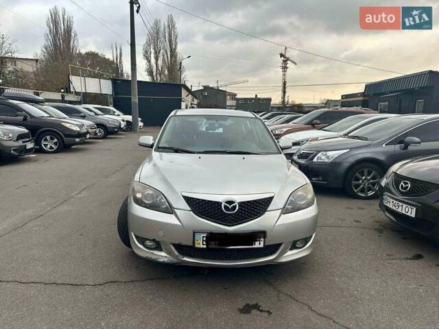 Серый Мазда 3, объемом двигателя 1.6 л и пробегом 125 тыс. км за 4200 $, фото 1 на Automoto.ua