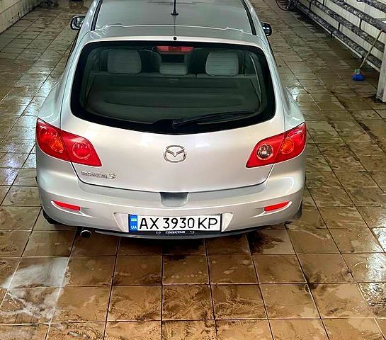 Серый Мазда 3, объемом двигателя 1.3 л и пробегом 193 тыс. км за 3100 $, фото 5 на Automoto.ua