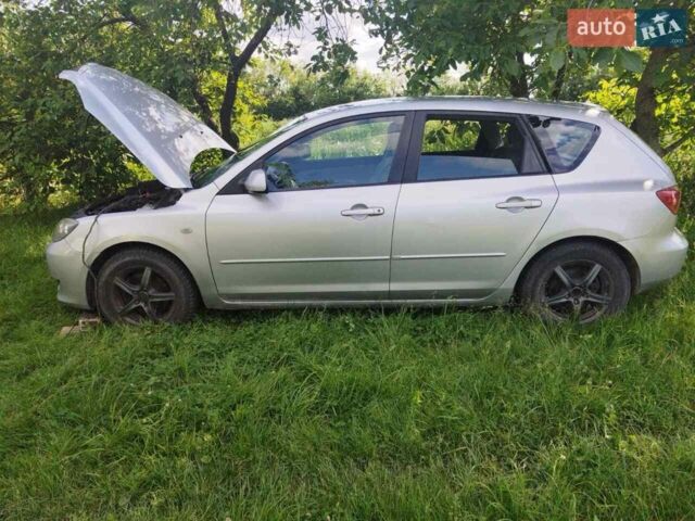 Сірий Мазда 3, об'ємом двигуна 1.4 л та пробігом 214 тис. км за 4299 $, фото 2 на Automoto.ua