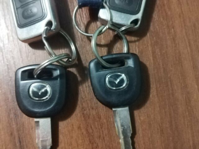 Сірий Мазда 3, об'ємом двигуна 1.4 л та пробігом 214 тис. км за 4299 $, фото 15 на Automoto.ua