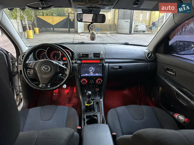 Сірий Мазда 3, об'ємом двигуна 1.6 л та пробігом 267 тис. км за 4000 $, фото 11 на Automoto.ua