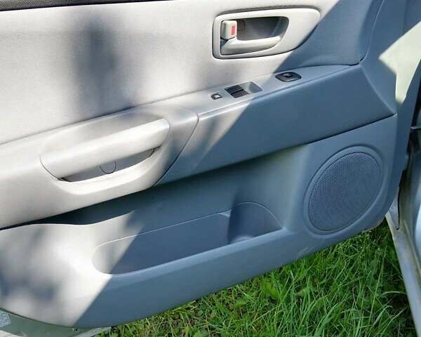 Сірий Мазда 3, об'ємом двигуна 1.4 л та пробігом 214 тис. км за 4299 $, фото 12 на Automoto.ua